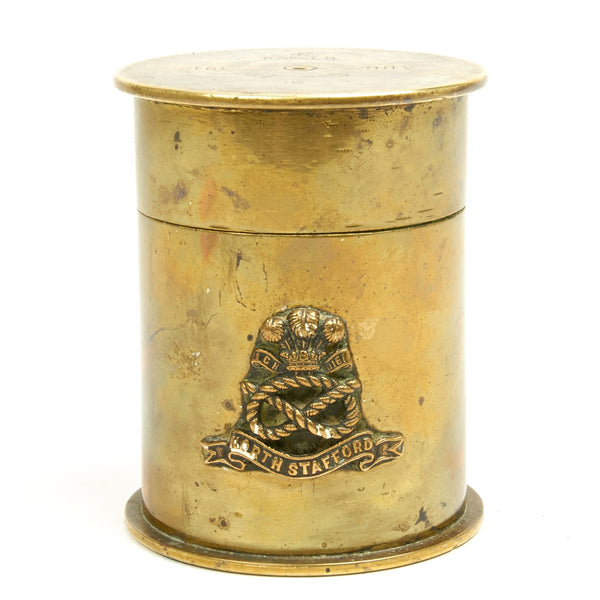 Militaria; a bugle, a brass trench art shell case, a Lancaster Division  cigarette case, etc.