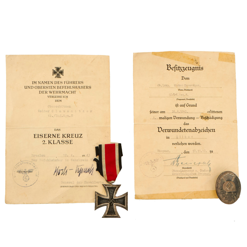 Original German WWII Set of 2 Awards with Documents Named to Oberschützen Walter Clausnitzer of Infantry Regiment 8