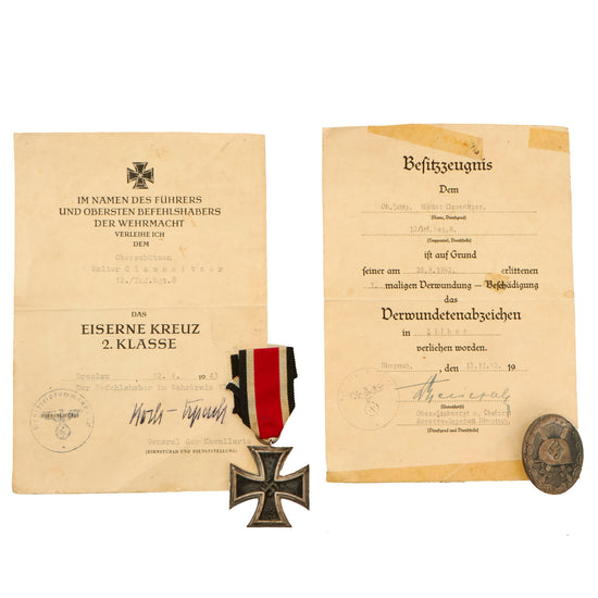 Original German WWII Set of 2 Awards with Documents Named to Oberschützen Walter Clausnitzer of Infantry Regiment 8