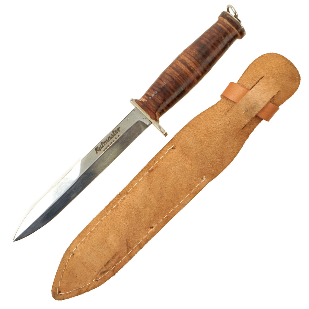 Original U.S. WWII to Post War Era Kutmaster Fighting Knife With 6 ¾” M3 Knife Style Blade and Original Leather Sheath Original Items